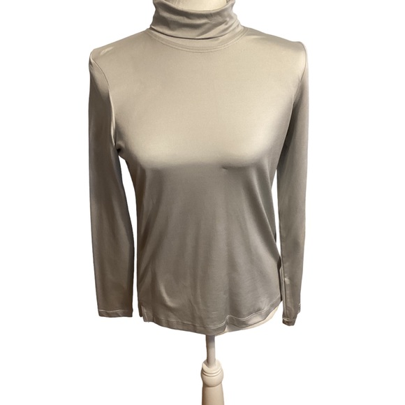 A’nue Miami Tops - A’nue Miami classic turtleneck in platinum NWT